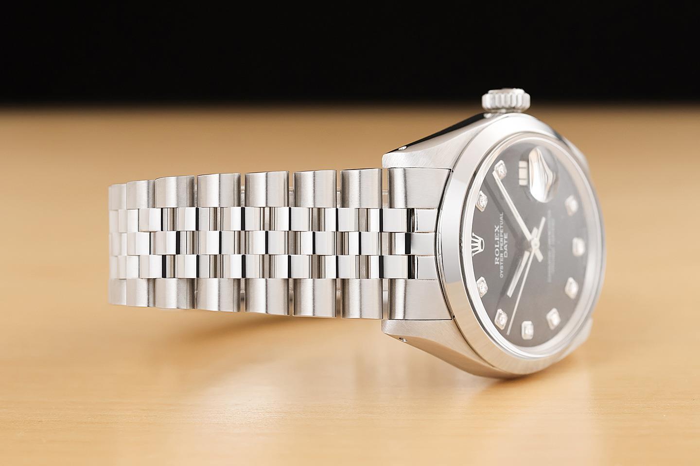 ROLEX OYSTER PERPETUAL DATE 1500 BLACK DIAMOND DIAL STAINLESS STEEL 34MM WATCH