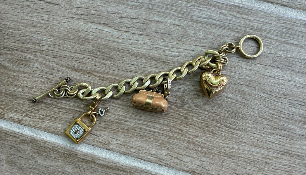 Authentic vintage Juicy Couture charm bracelet with 3 Charms (Bag, Lock, Heart)