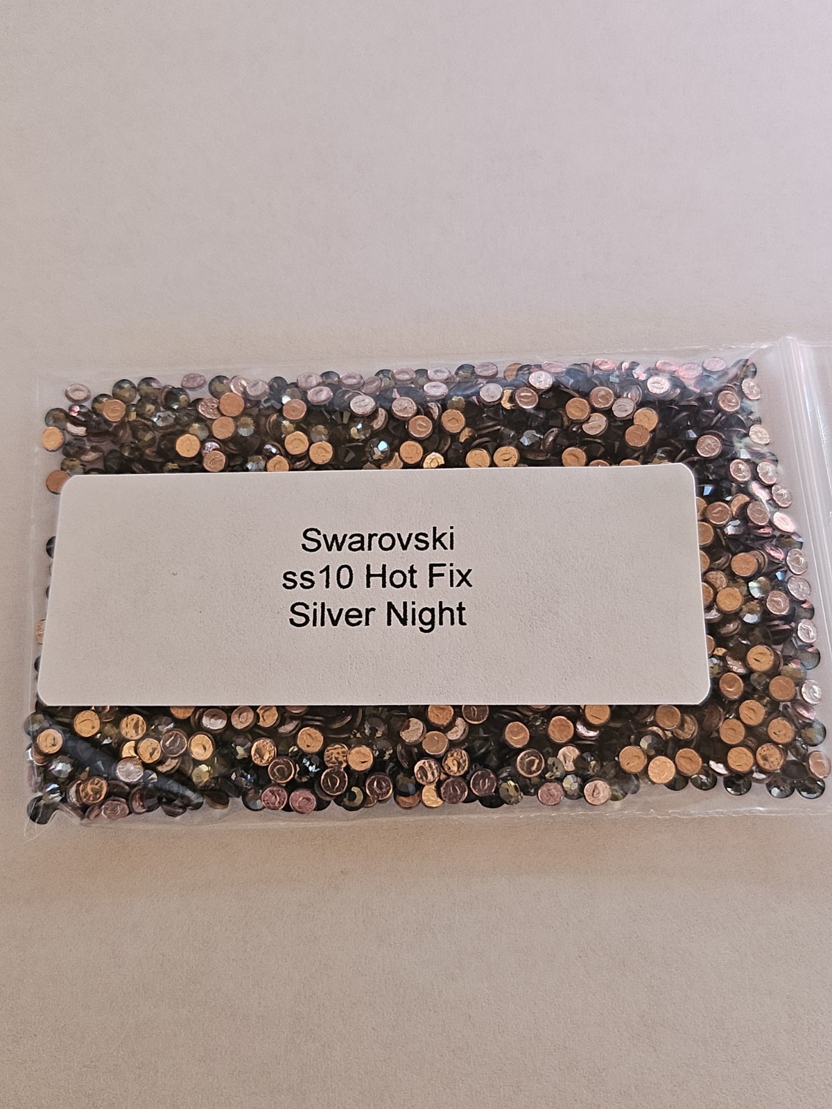 Genuine Swarovski ss10 Hot Fix Crystals in the color LIGHT COLORADO TOPAZ
