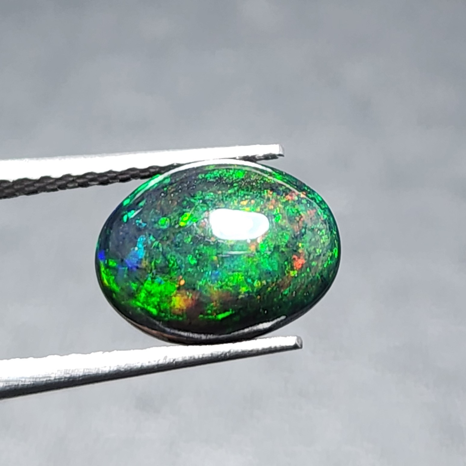 Natural Welo Black Opal Ethiopia Oval Cabochon Vivid Green Fire Gemstone 1.20Ct