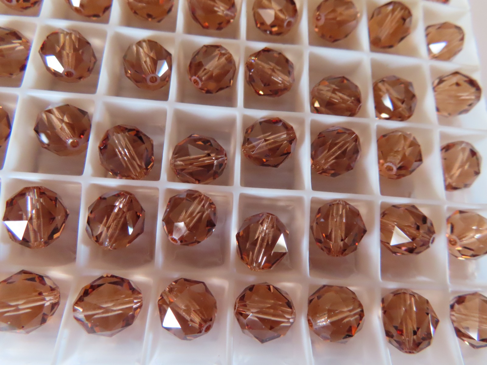 24 Swarovski Crystal faceted beads 8mm Light Smoked Topaz. #5025
