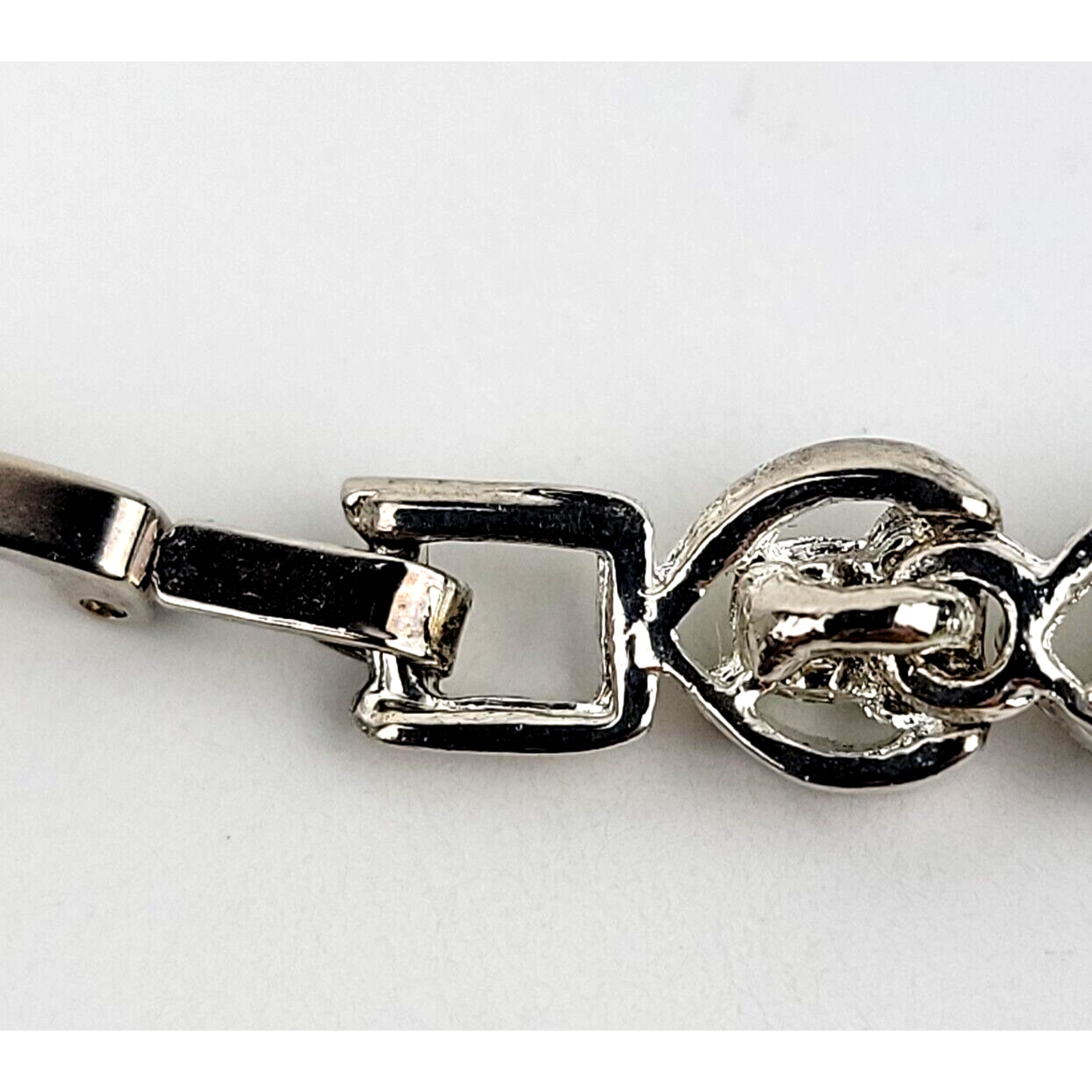 Heart Shaped Tennis Bracelet Silver Tone Link with Rhinestones Fold Over Clasp