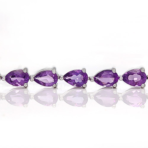 9 CARAT TW AMETHYST PLATINUM OVER 0.925 STERLING SILVER TENNIS BRACELET 7in