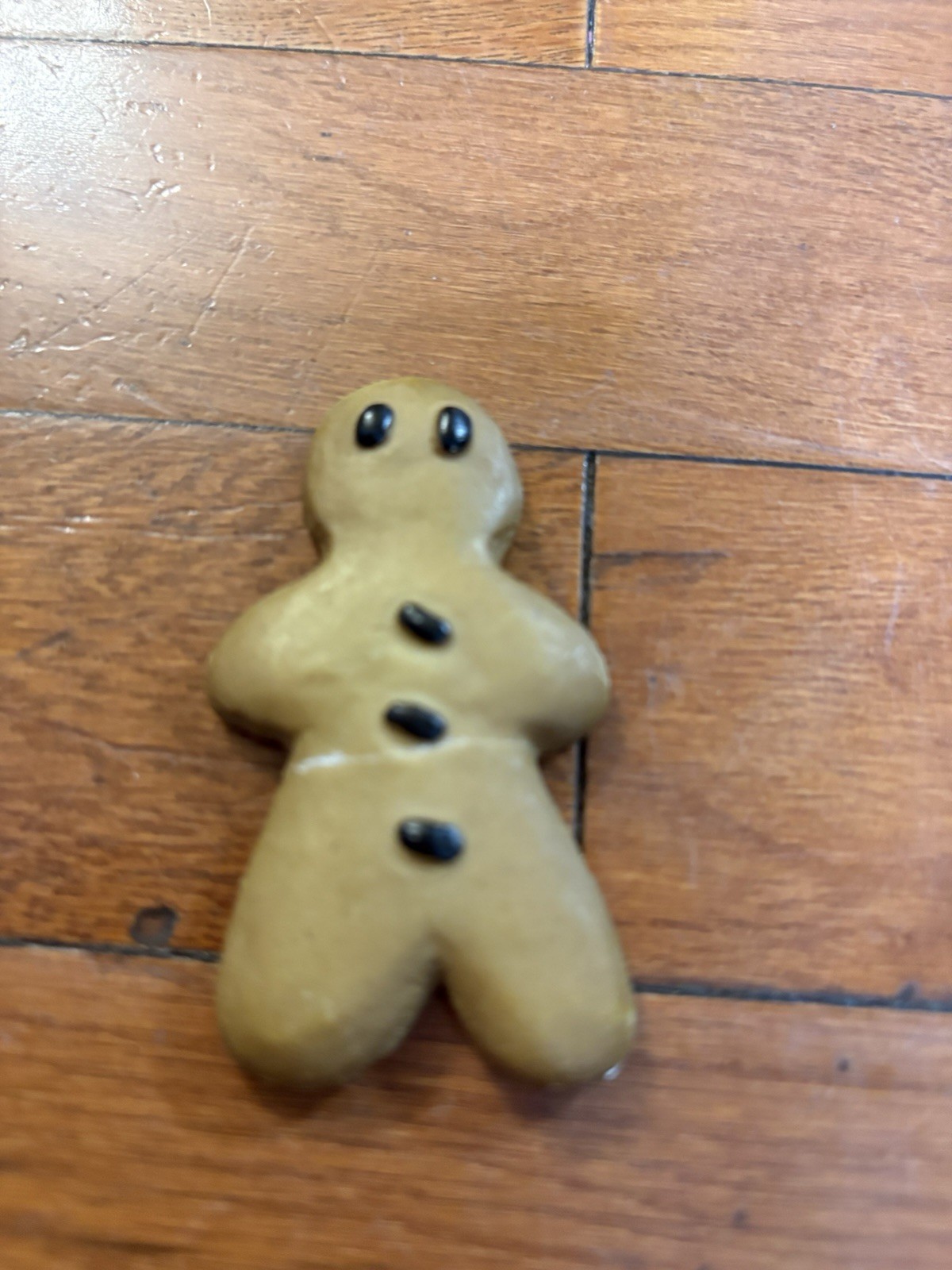 Gingerbread Man Ceramic Magnet/Broke in the Middle and was repaired with glue