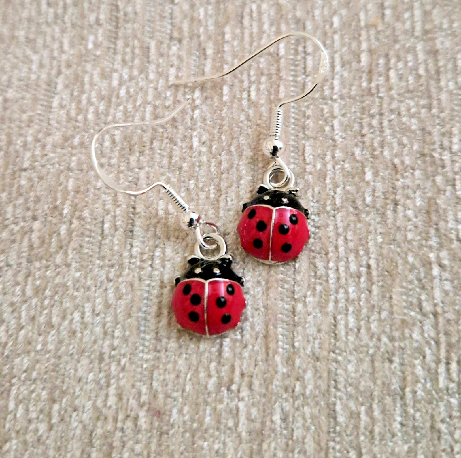 Ladybug earrings in a choice of silver or gold on stamped 925 hooks, summer gift
