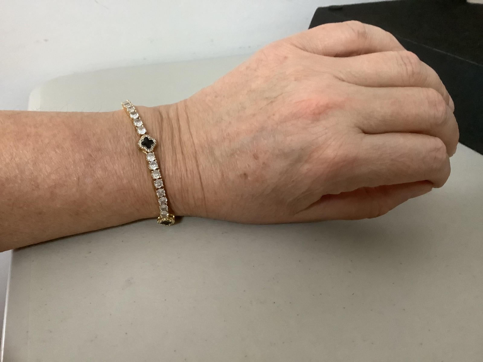 Imperium 18k gold plated CZs four leaf clover black enamel tennis bracelet 7″