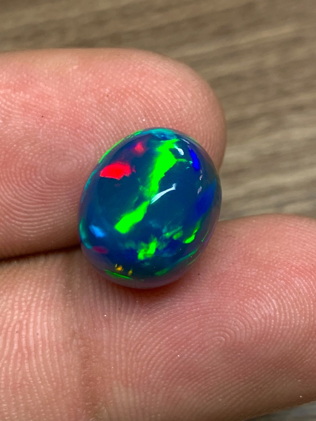 Ethiopian Opal Gemstone 6.35crt Black Oval Cabochon Rainbow Flash Welo Loose Gem
