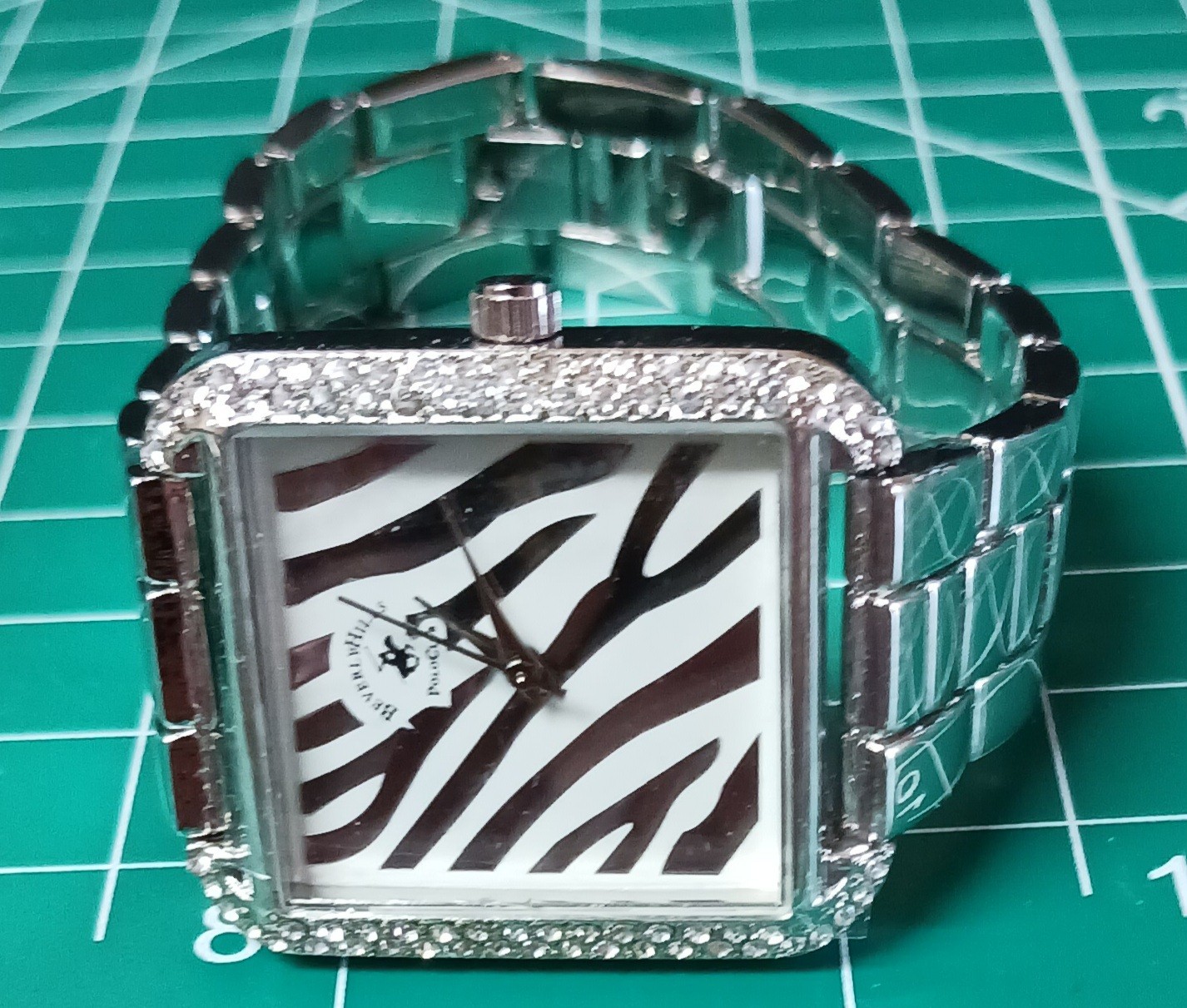 BH Polo Club Ladie’s watch zebra-patterned dial & square case w/rhinestones