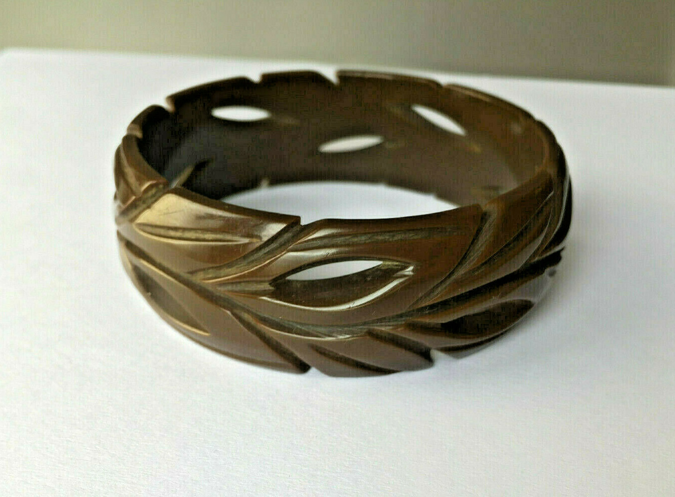 Vintage Bakelite 2.56” Carved leaves Bakelite bangle in dark brown color 1”