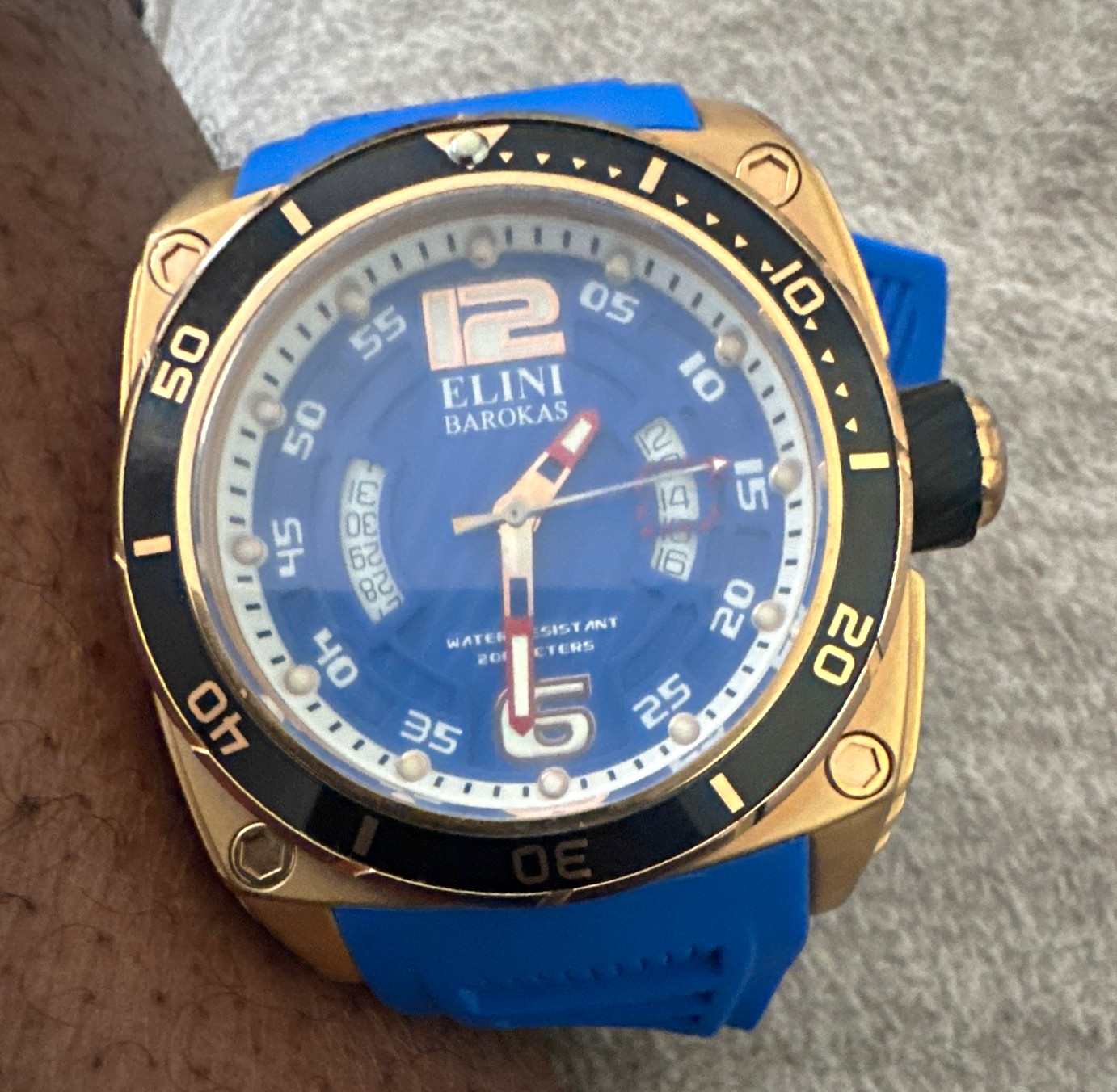 Elini Barokas Men’s Diver Quartz 200m Blue Dial Gold Case Blue Rubber Date