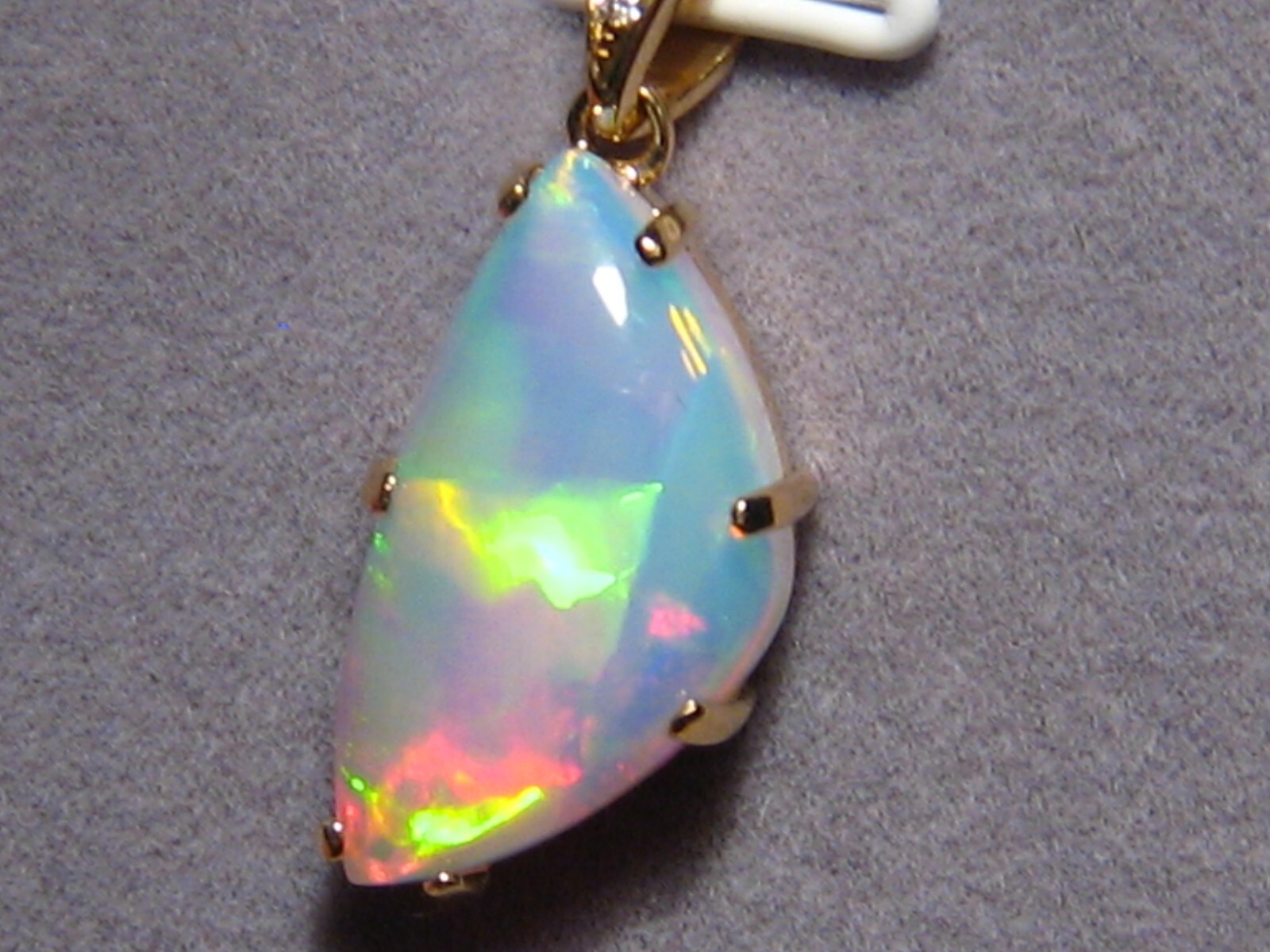 5.1 ct. Ethiopian Gem Opal and Diamond Pendant , 18 k Yellow Gold