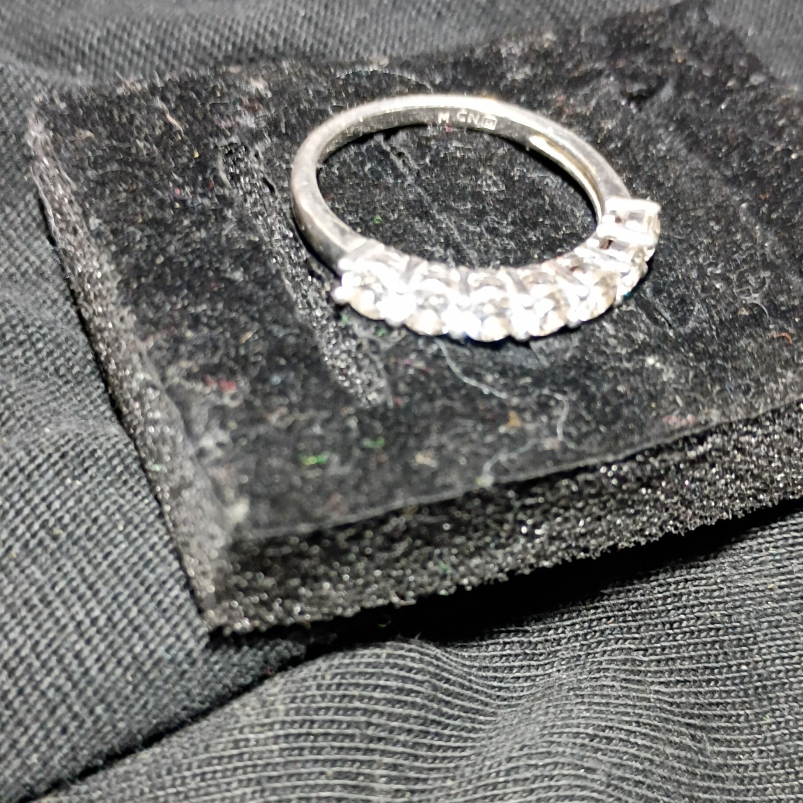 Silver Tone Metal Signed Eternity Band Ring Clear Round Stones Prong Size 7