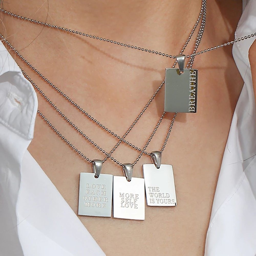 The World Is Yours Pendant Necklace 18K White Gold Plated Stainless Steel