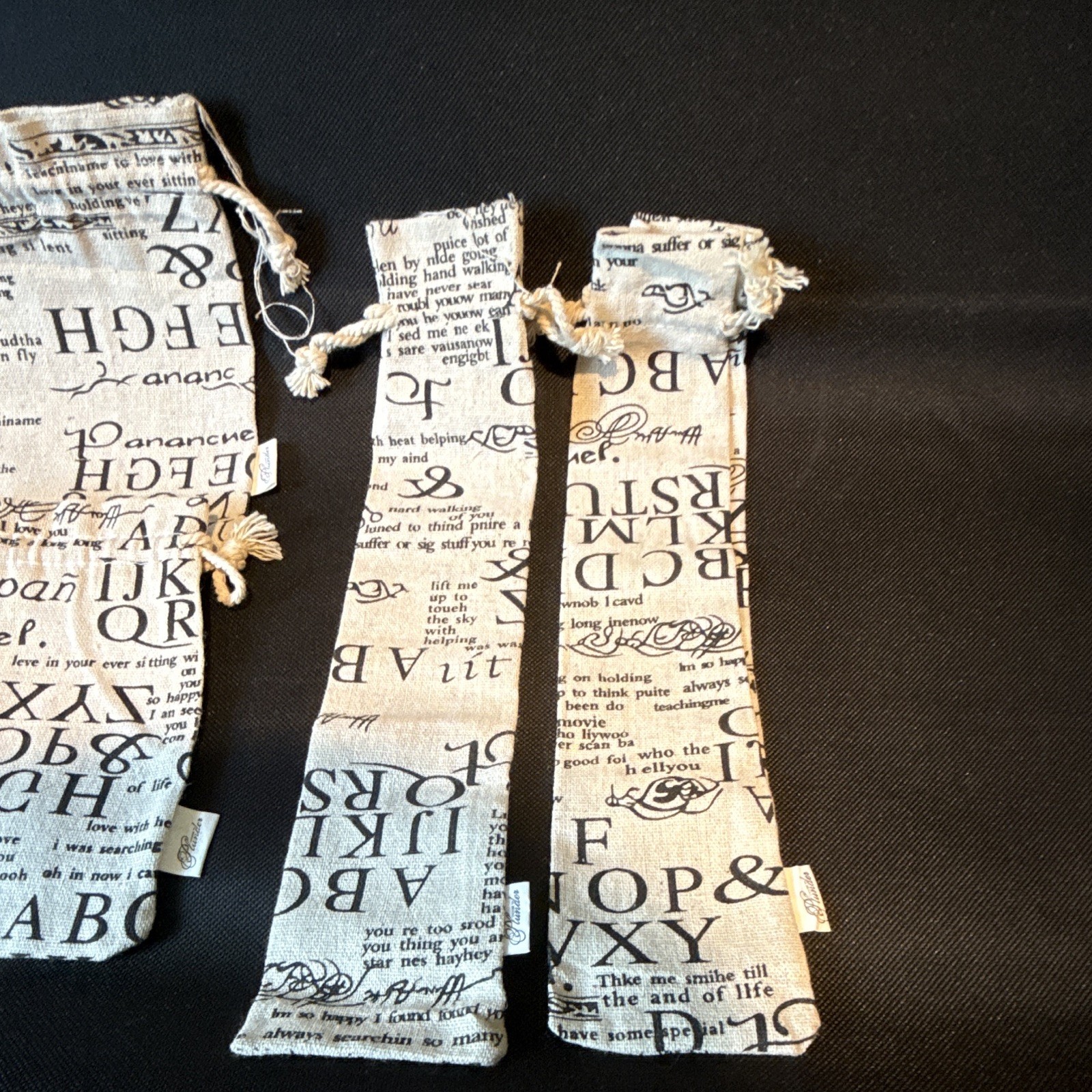 Set of 4 Fabric Drawstring Jewelry Pouches Letter Print Beige/Black Rectangle