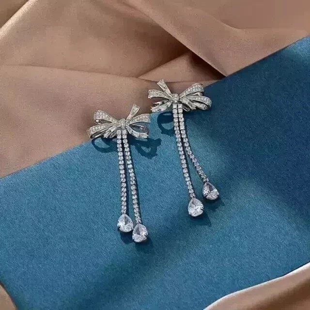 Bow Shape Drop Earrings In 14k White Gold Plated 2Ct Pear Cut Simulated Diamond