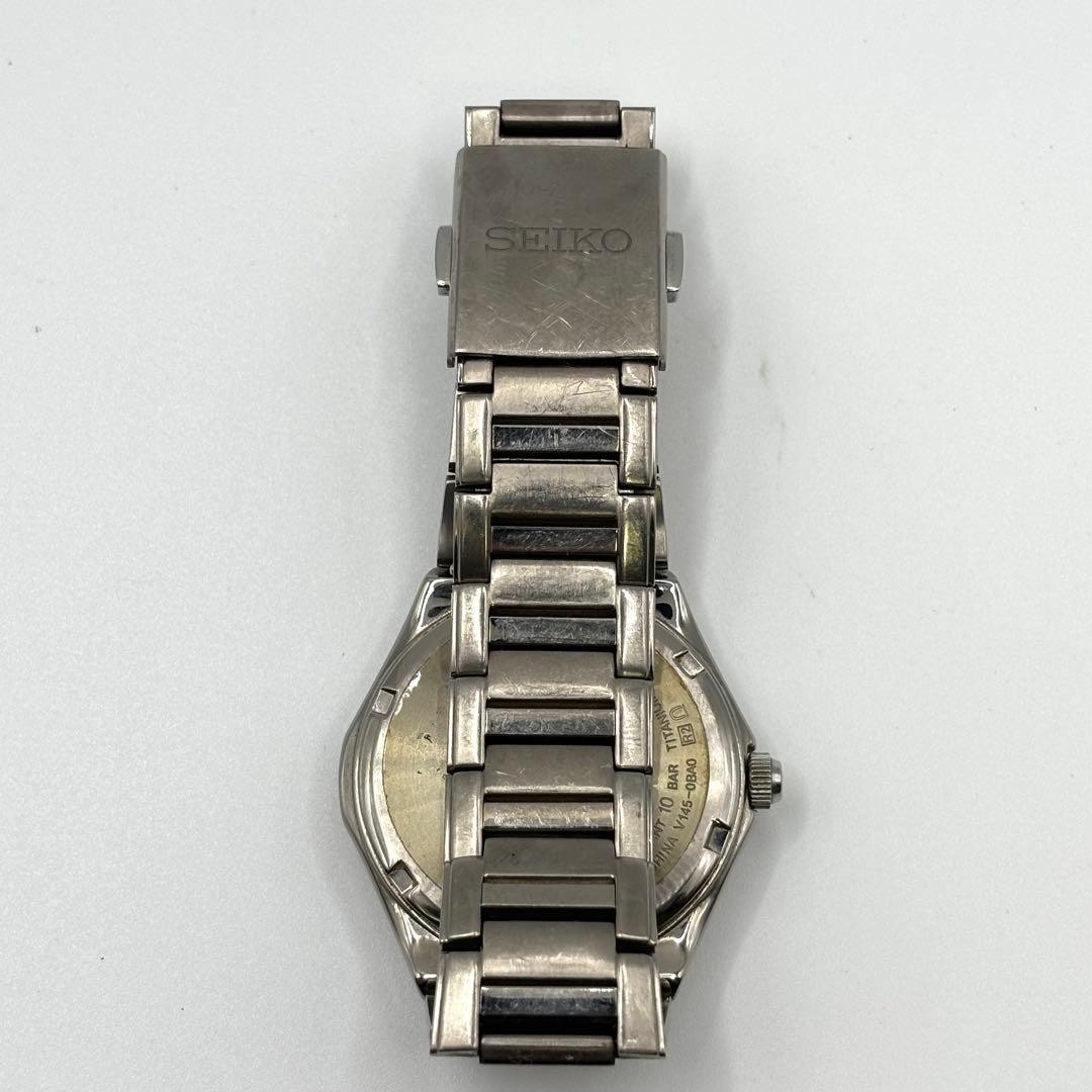 Working ,SEIKO solar-powered titanium watch with mother-of-pearl dial,From Japan