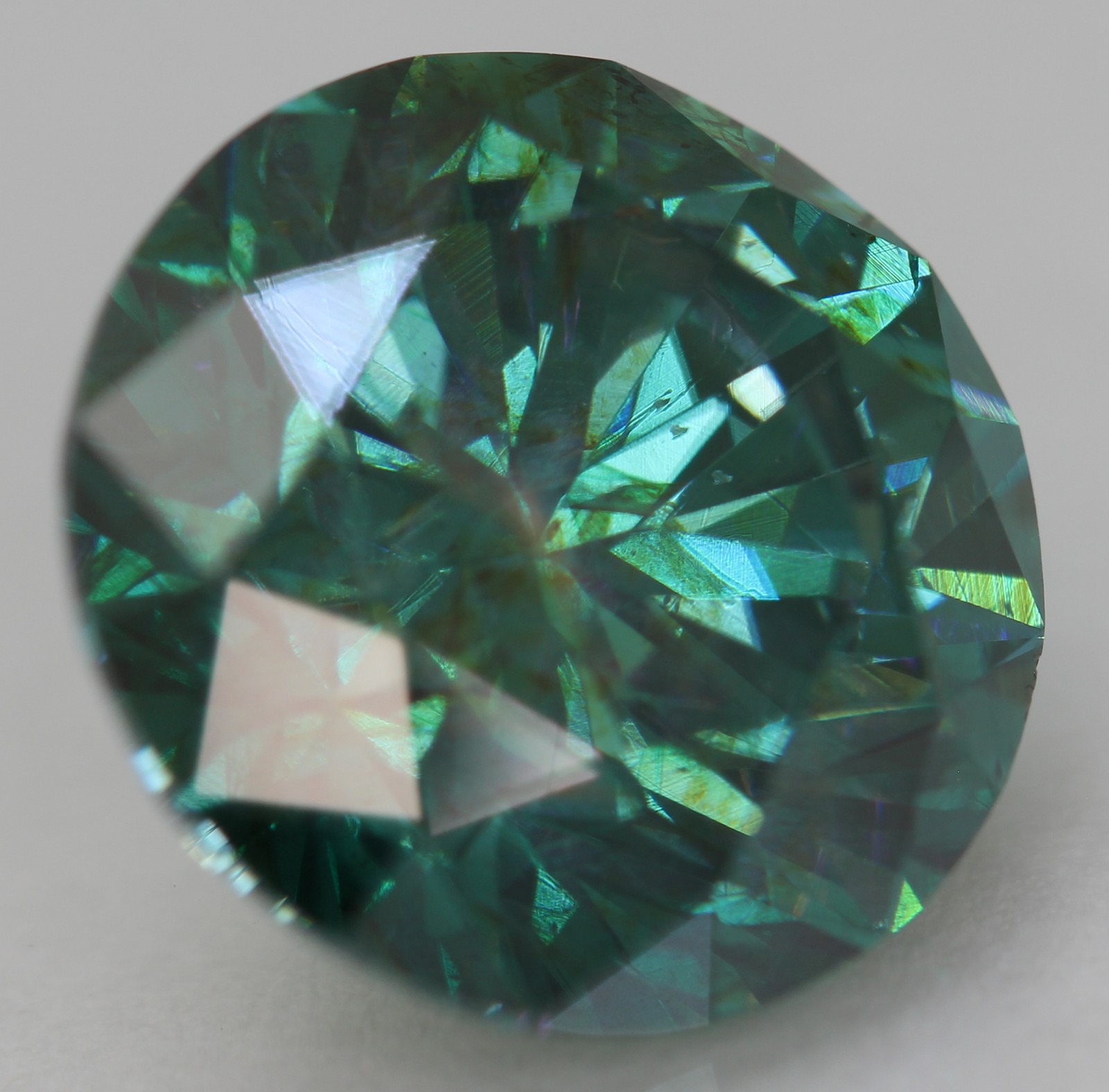 Cert 4.24 Carat Vivid Blue VVS2 Round Brilliant Natural Enhanced Diamond 10.2mm