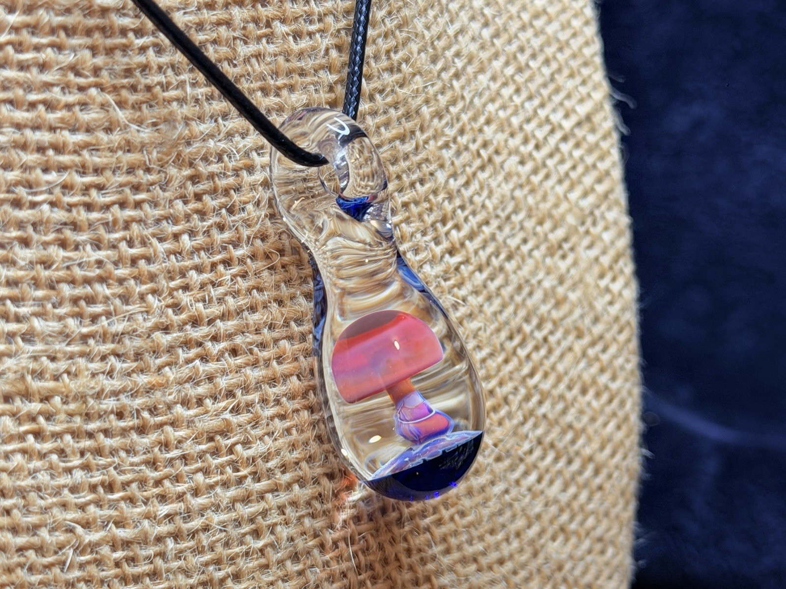 Glass Teardrop Mushroom Pendant in reds and purples with cobalt blue base