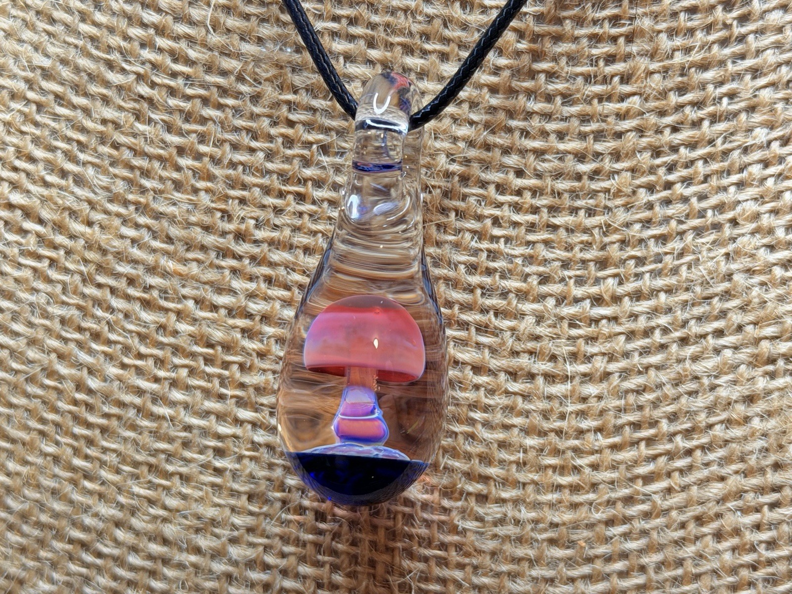 Glass Teardrop Mushroom Pendant in reds and purples with cobalt blue base