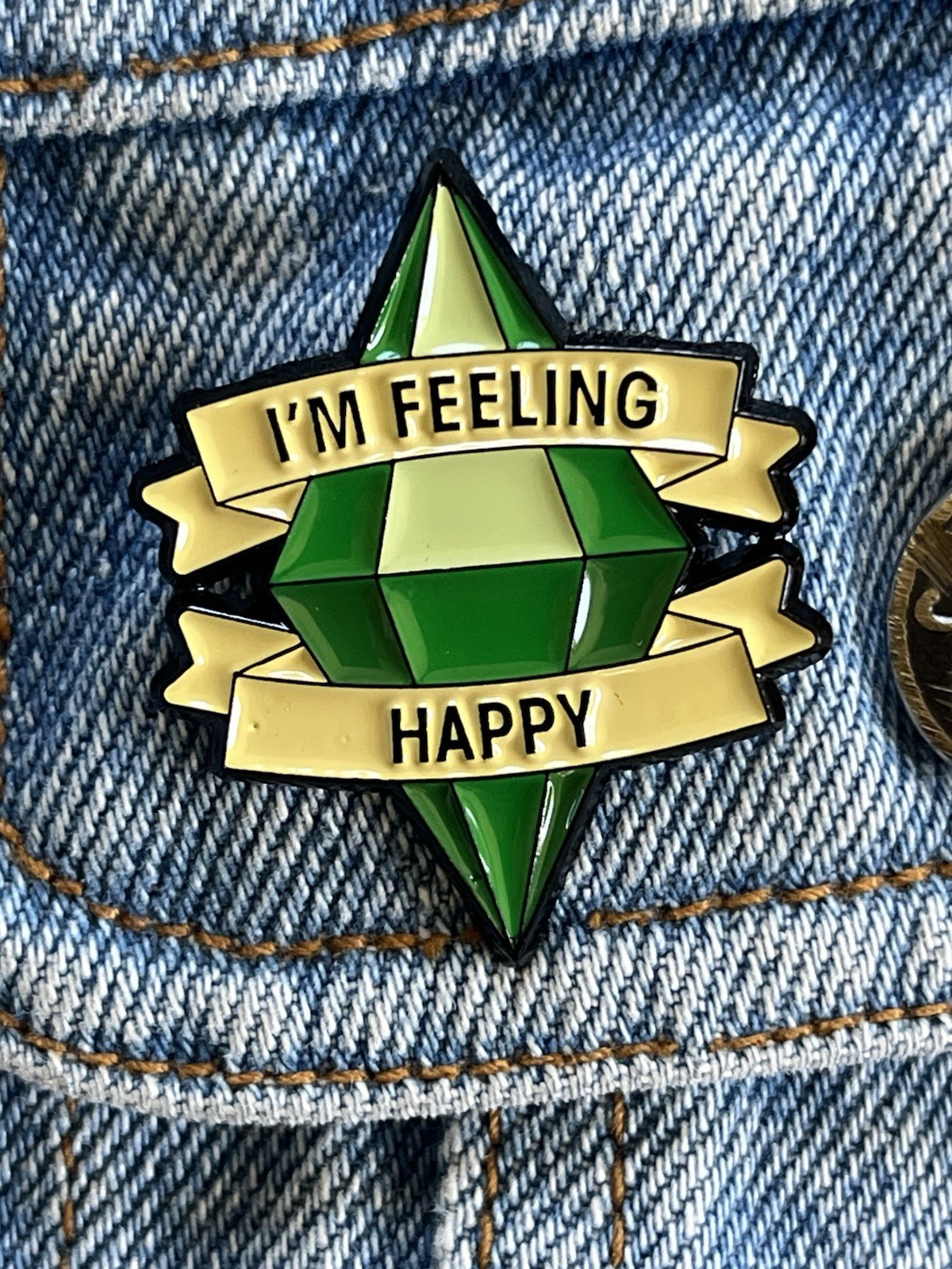 The Sims – PlumbBomb Icon “I’m Feeling Happy” Simlish Video Games Enamel Pin