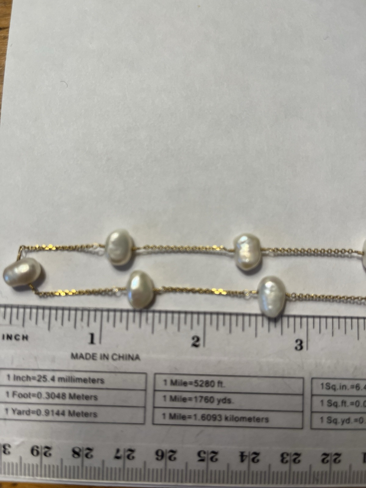 Stunning 14K gold 18″ pearl station necklace heavy 8.8 Grams.