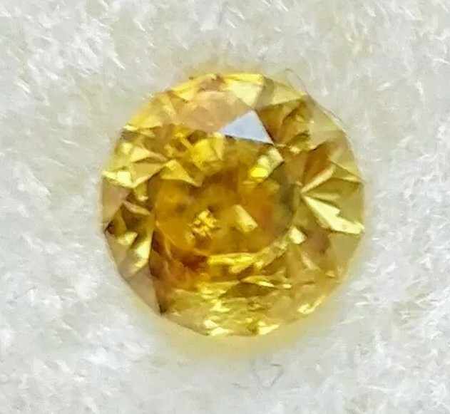 .61 carat loose Montana Sapphire. Mined and cut in AMERICA. Fancy Yellow. Round.