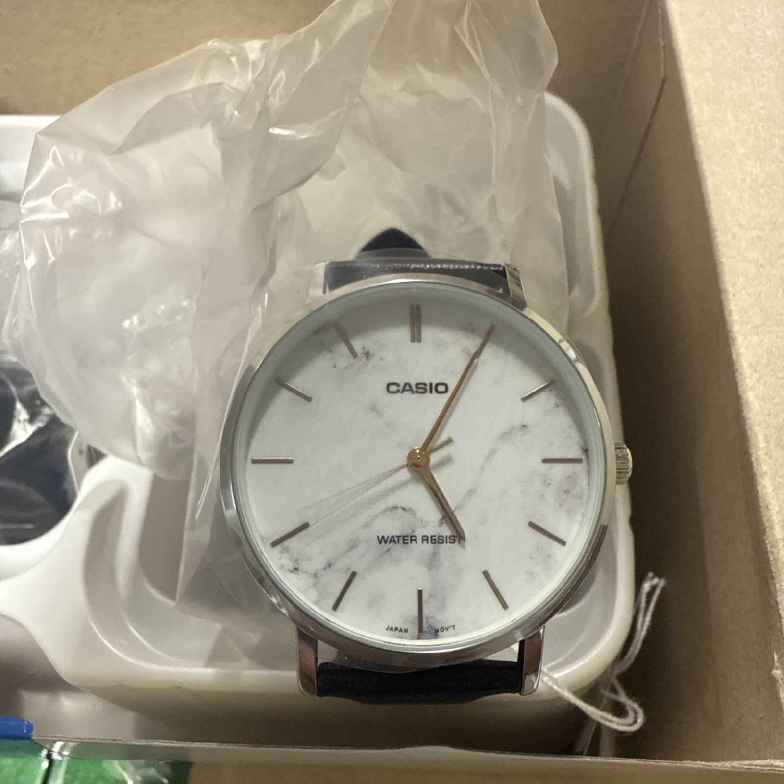 Casio MTP-VT01LM-7A Men’s Minimalistic White Marbled Dial Leather Band Watch