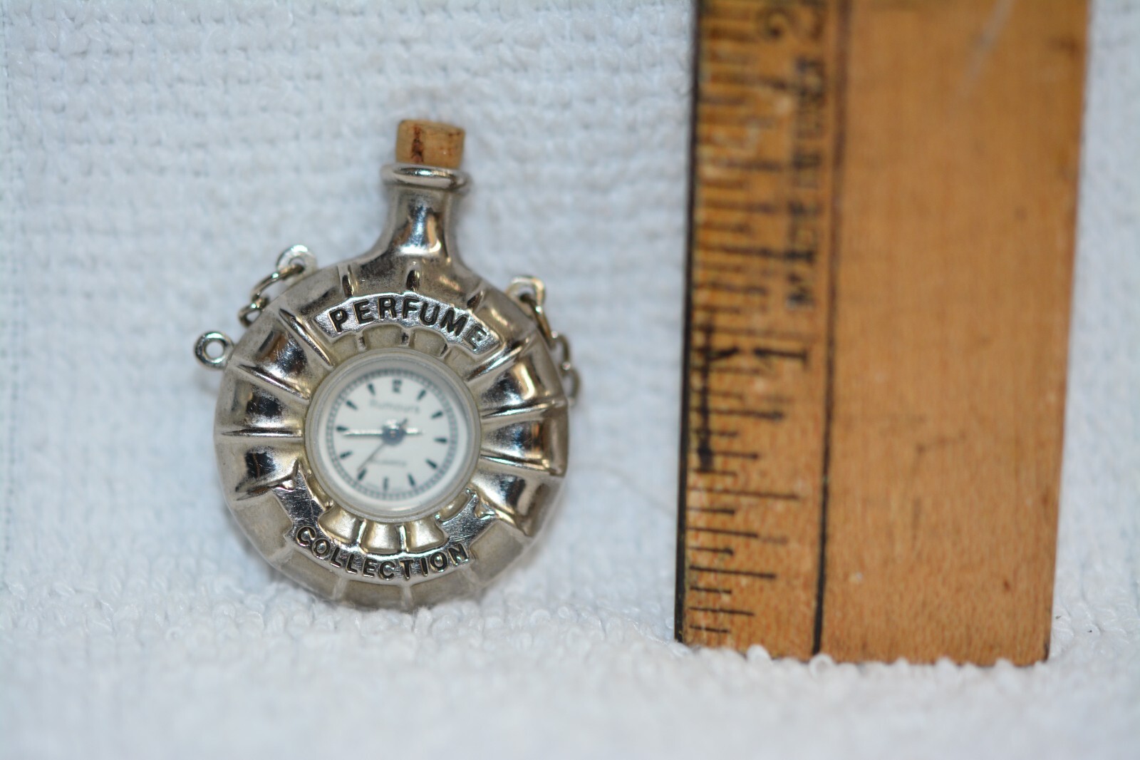 Watch ladies. Rumours miniature watch pendant perfume compo