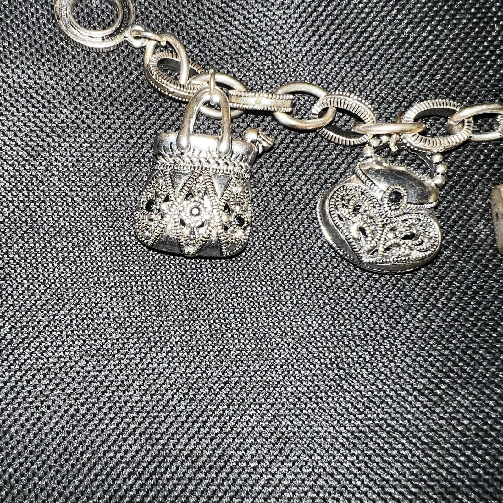Silver-Tone Metal Puffy Openwork Purse Rhinestone Accent Charm Bracelet toggle
