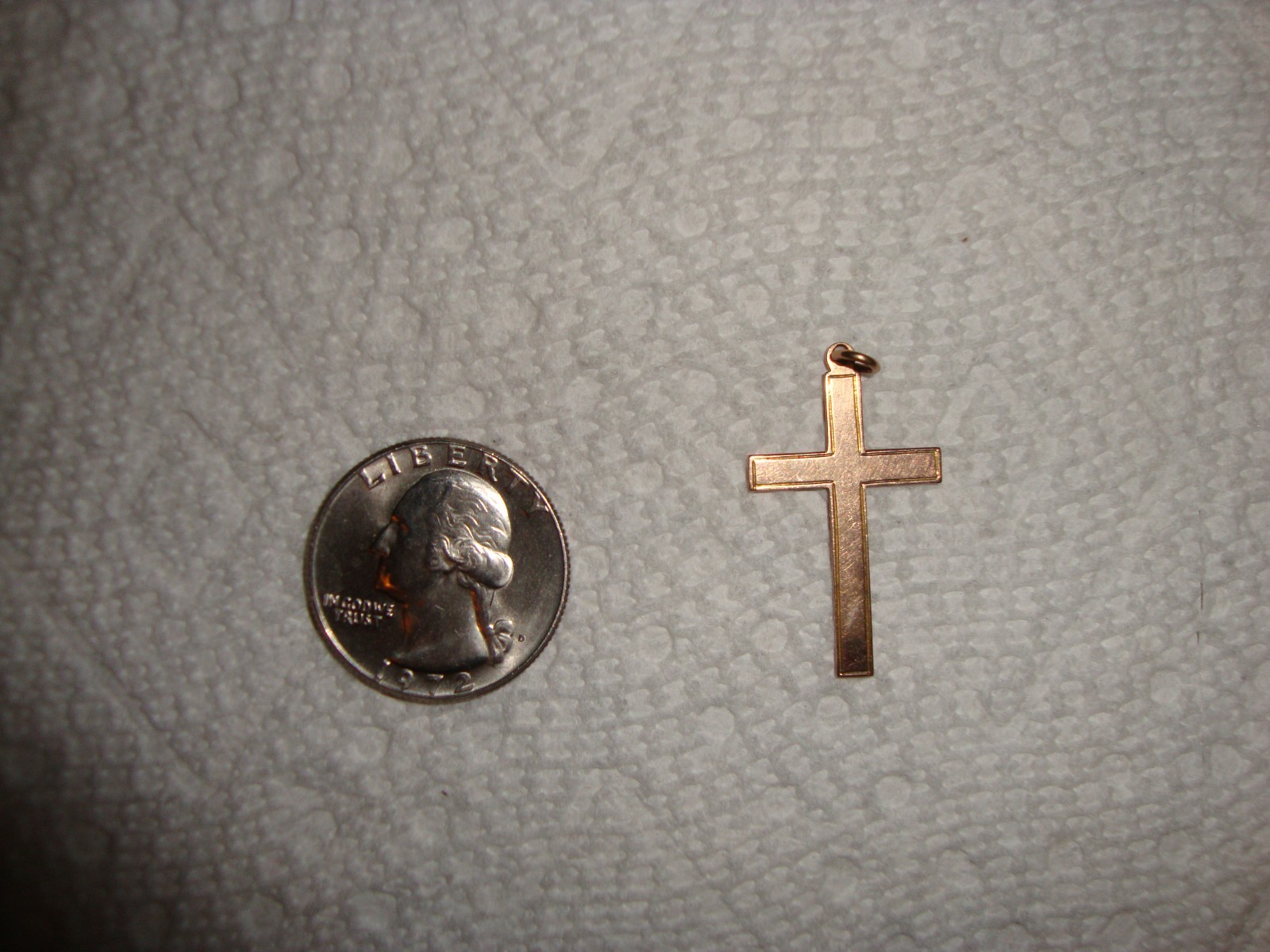 9 kt gold cross and hollow silver cross with silver chain