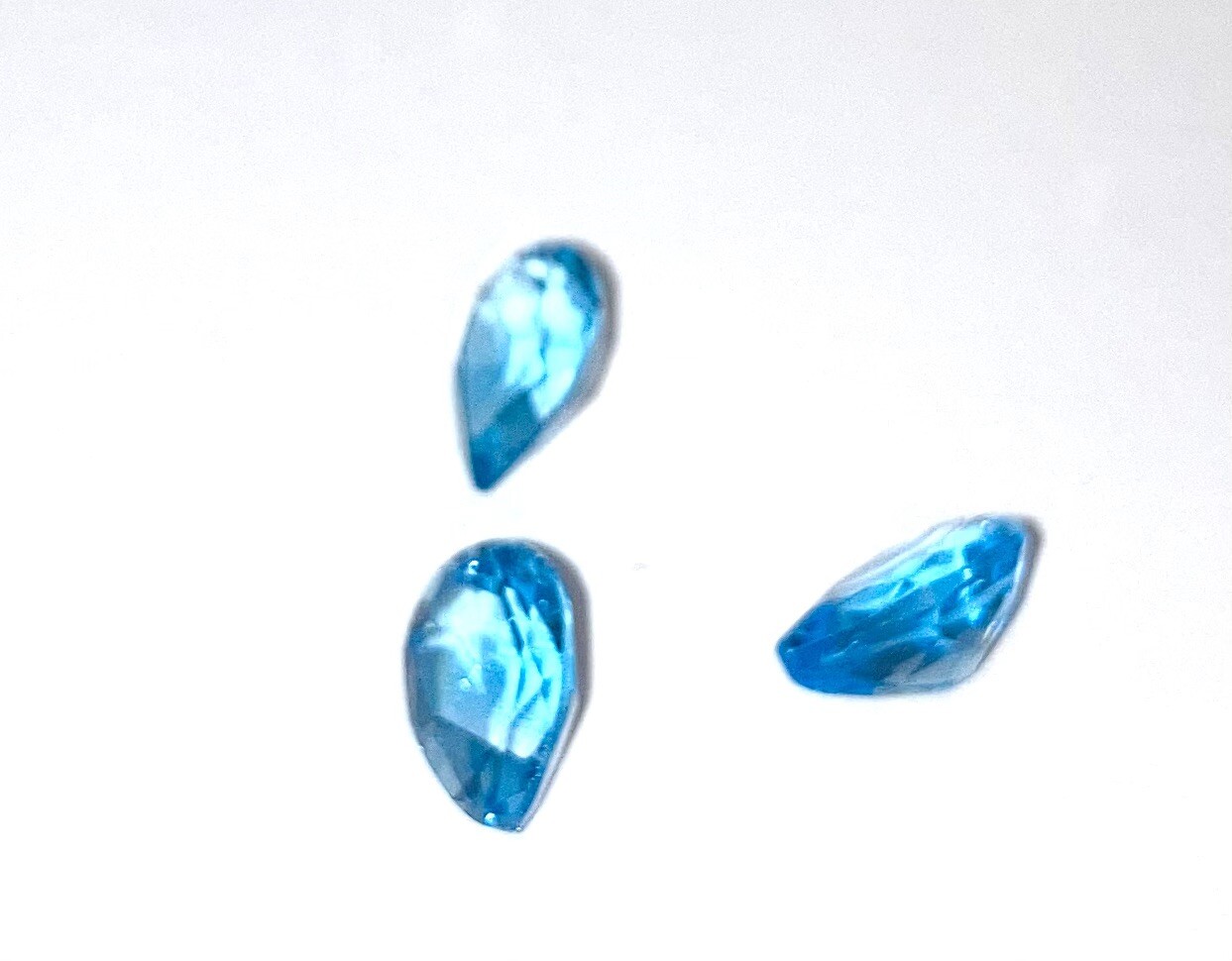 Topaz Swiss Blue 9 x7 mmm Pear shaped stones set of 3 approx 25 carats