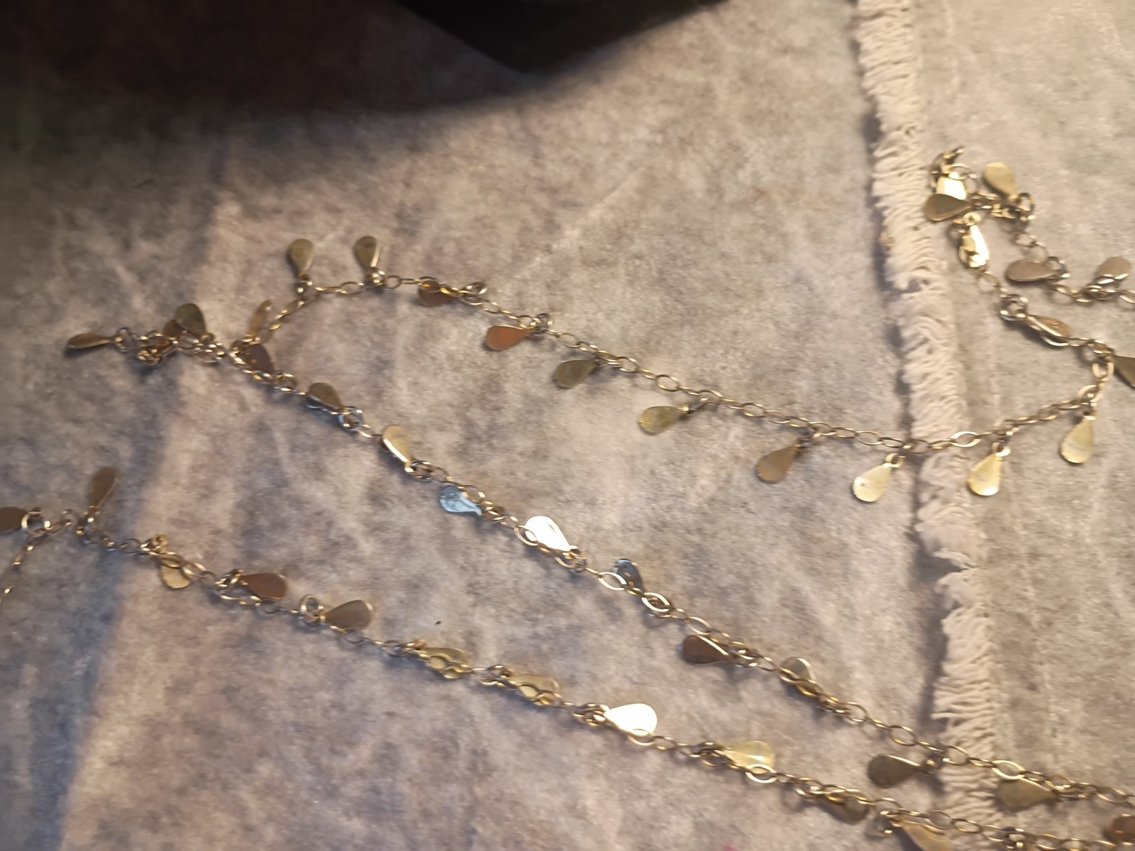 Gold Toned Tear Drop Charmed 56 Inch Taper Single Strand Necklace. J2