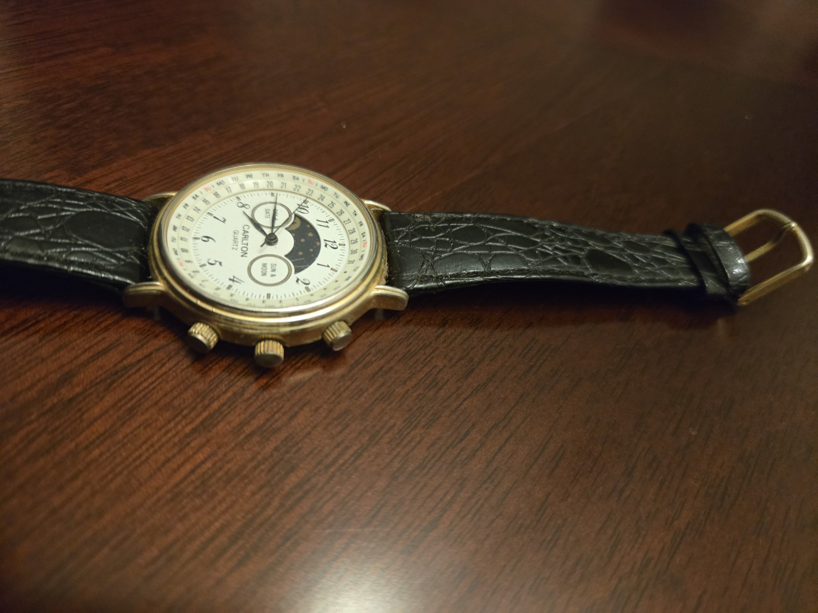 Carlton Quartz Moon & Sun Phase Date Gold Watch White Dial Black Leather Strap