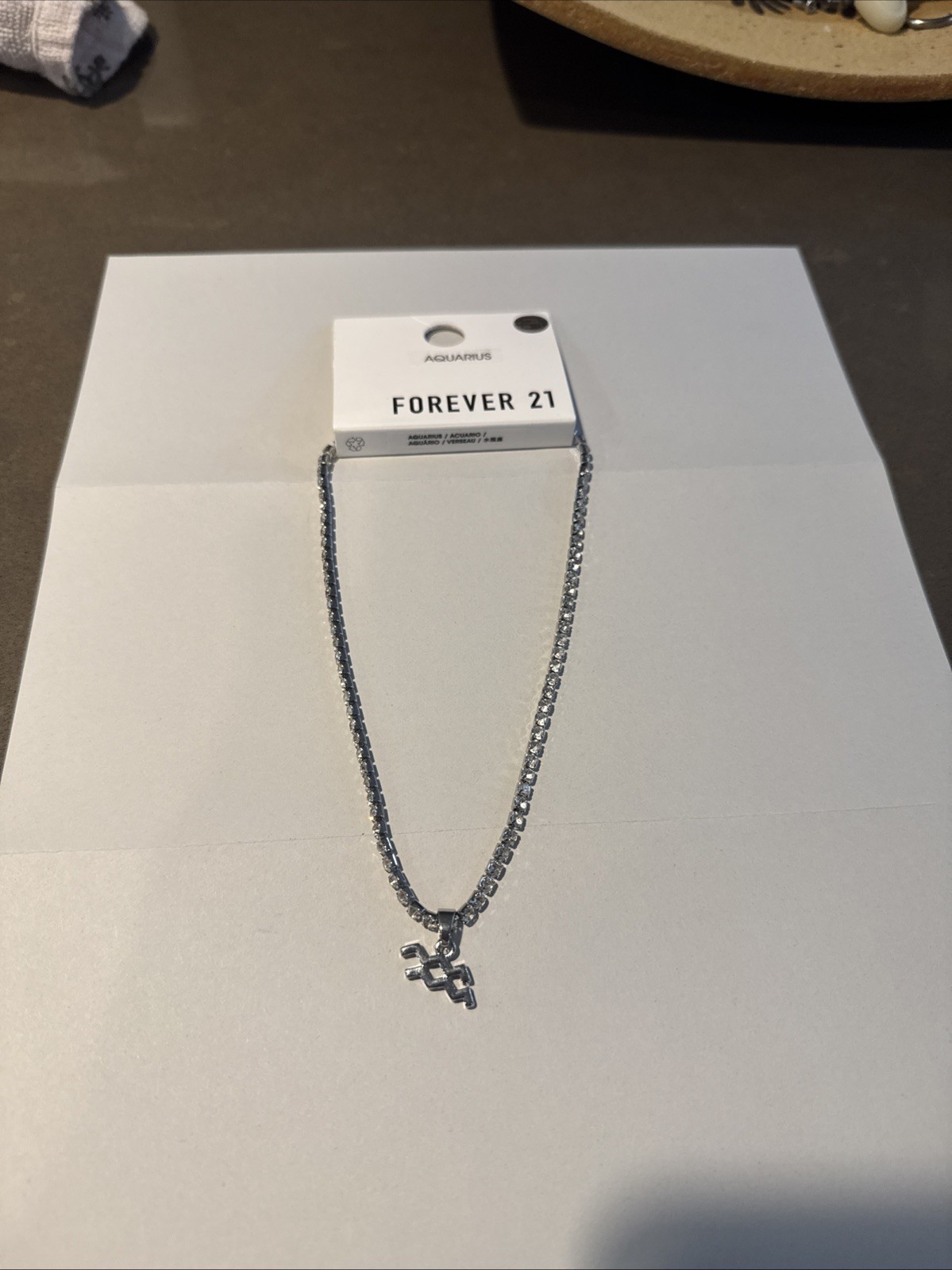 Zodiac sign necklace, silver .