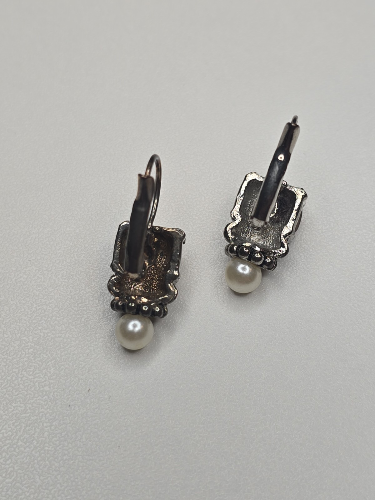 sterling silver Lagos earrings, smoky quartz stone and pearl accent.
