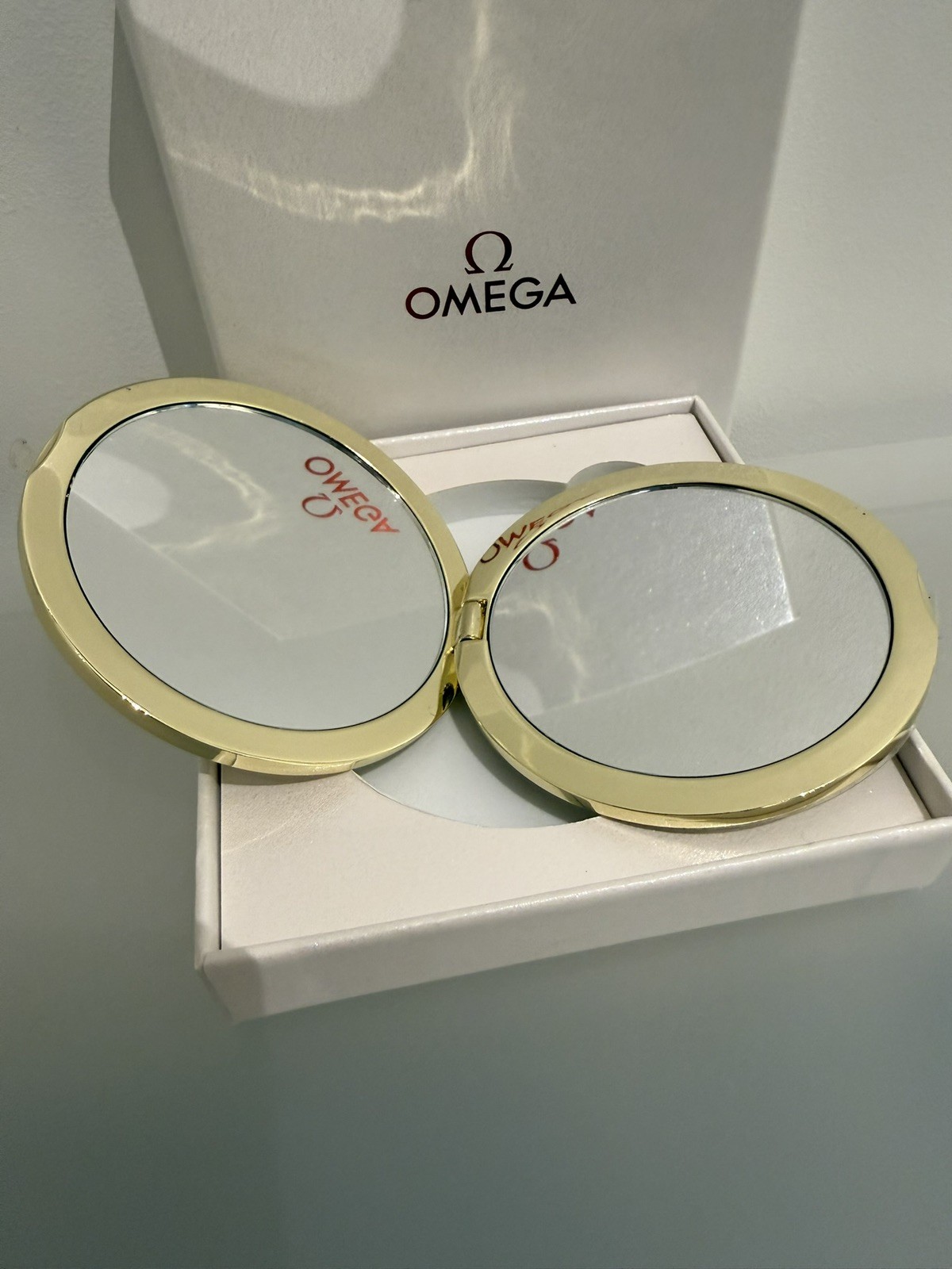 Omega Gold-Tone Compact Mirror – Floral & Butterfly Design