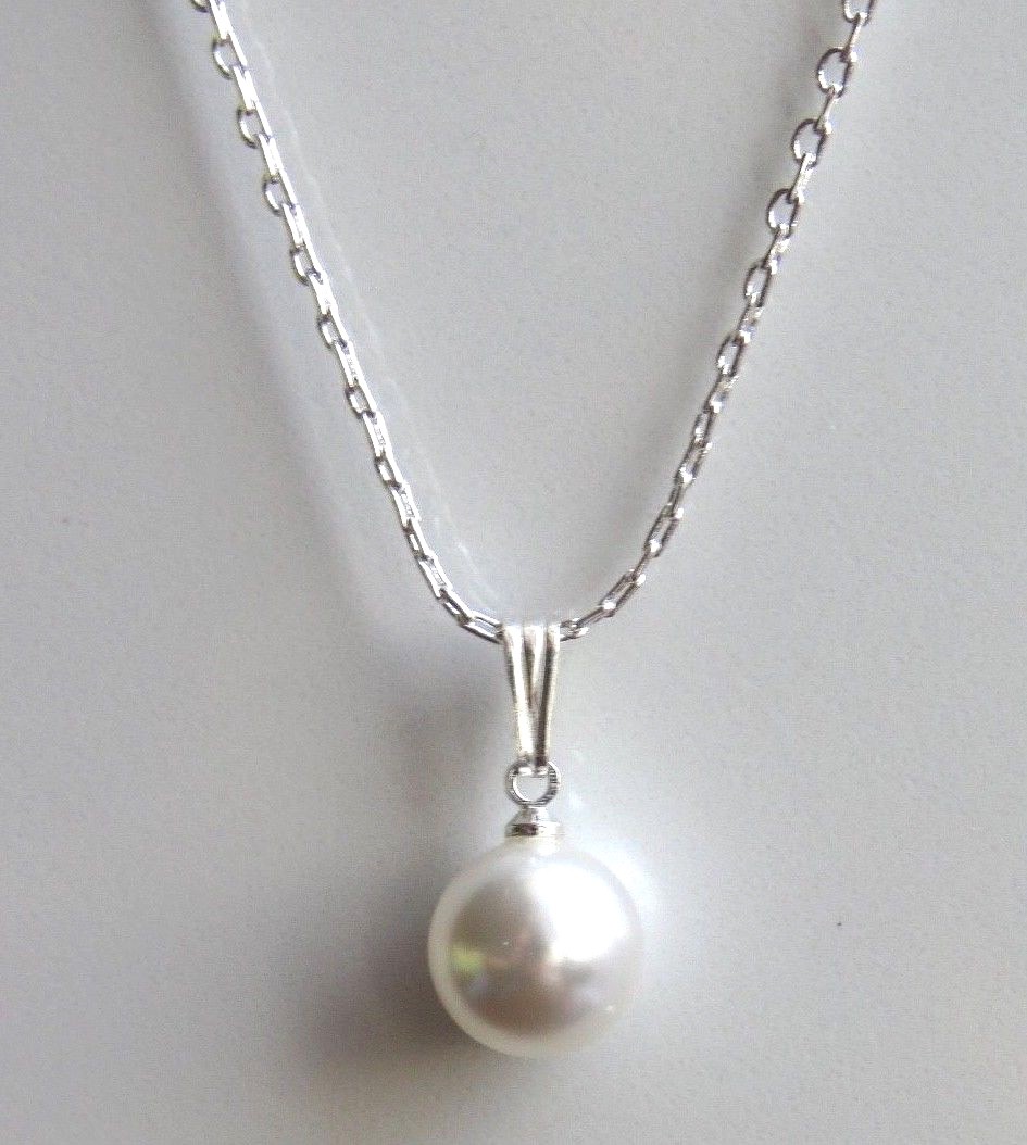 sa9. Silver Plated Necklace Made With a Swarovski White Pearl Pendant