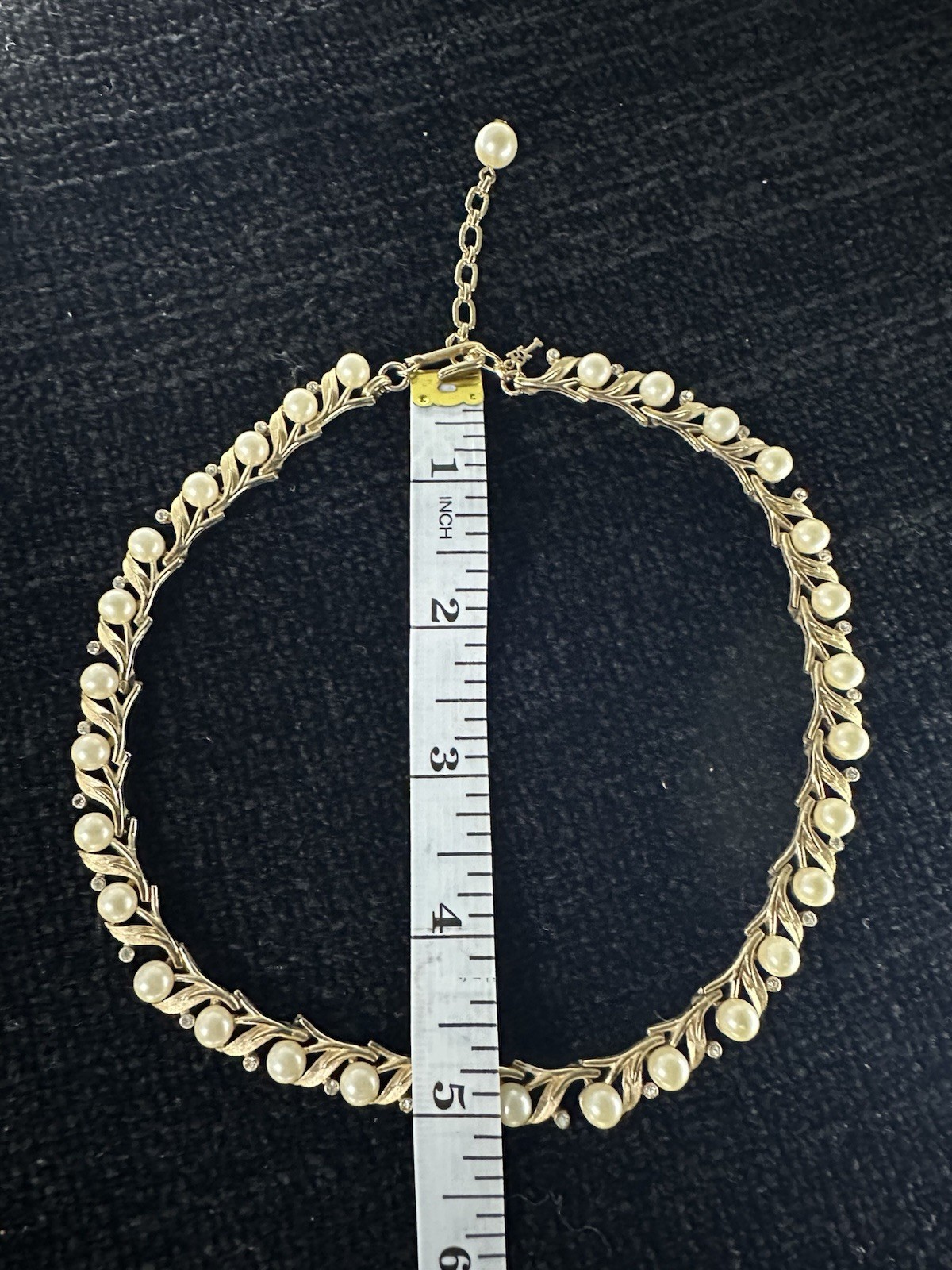 Vintage Crown Trifari Signed brushed Gold Tone Faux Pearl with rhinestone.