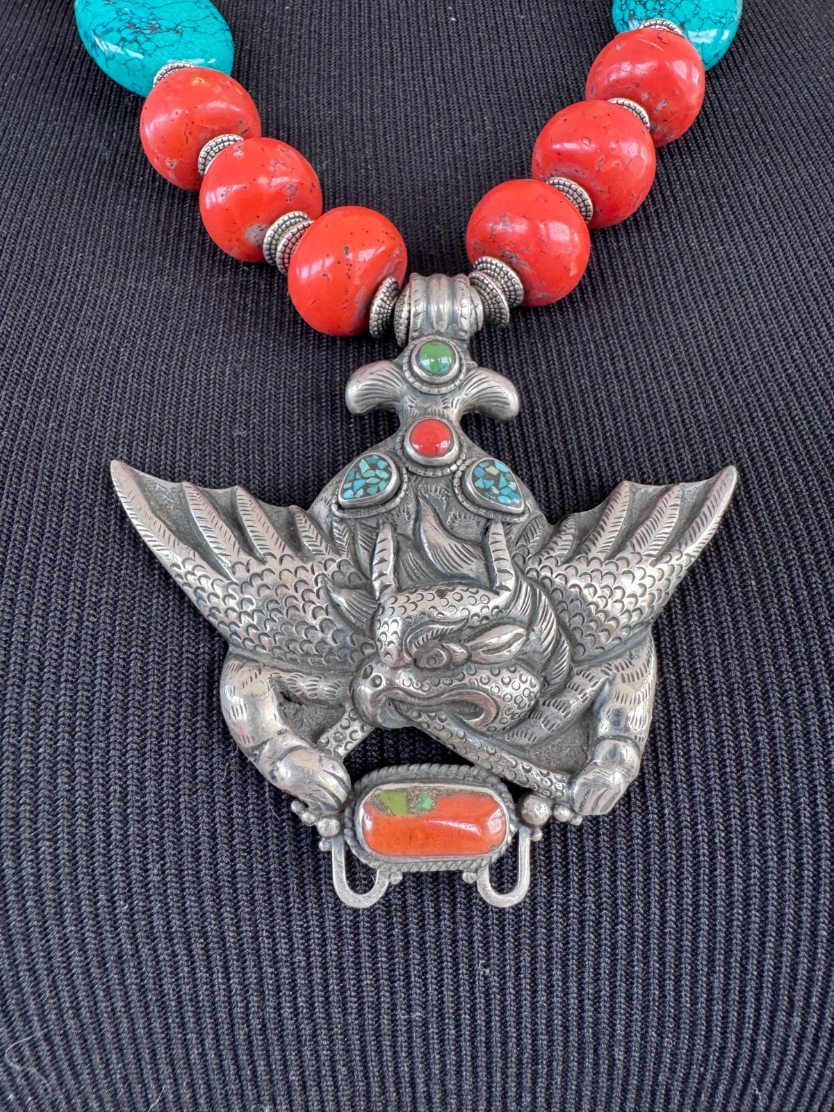 Silver Garuda pendant strung with natural coral and turquoise