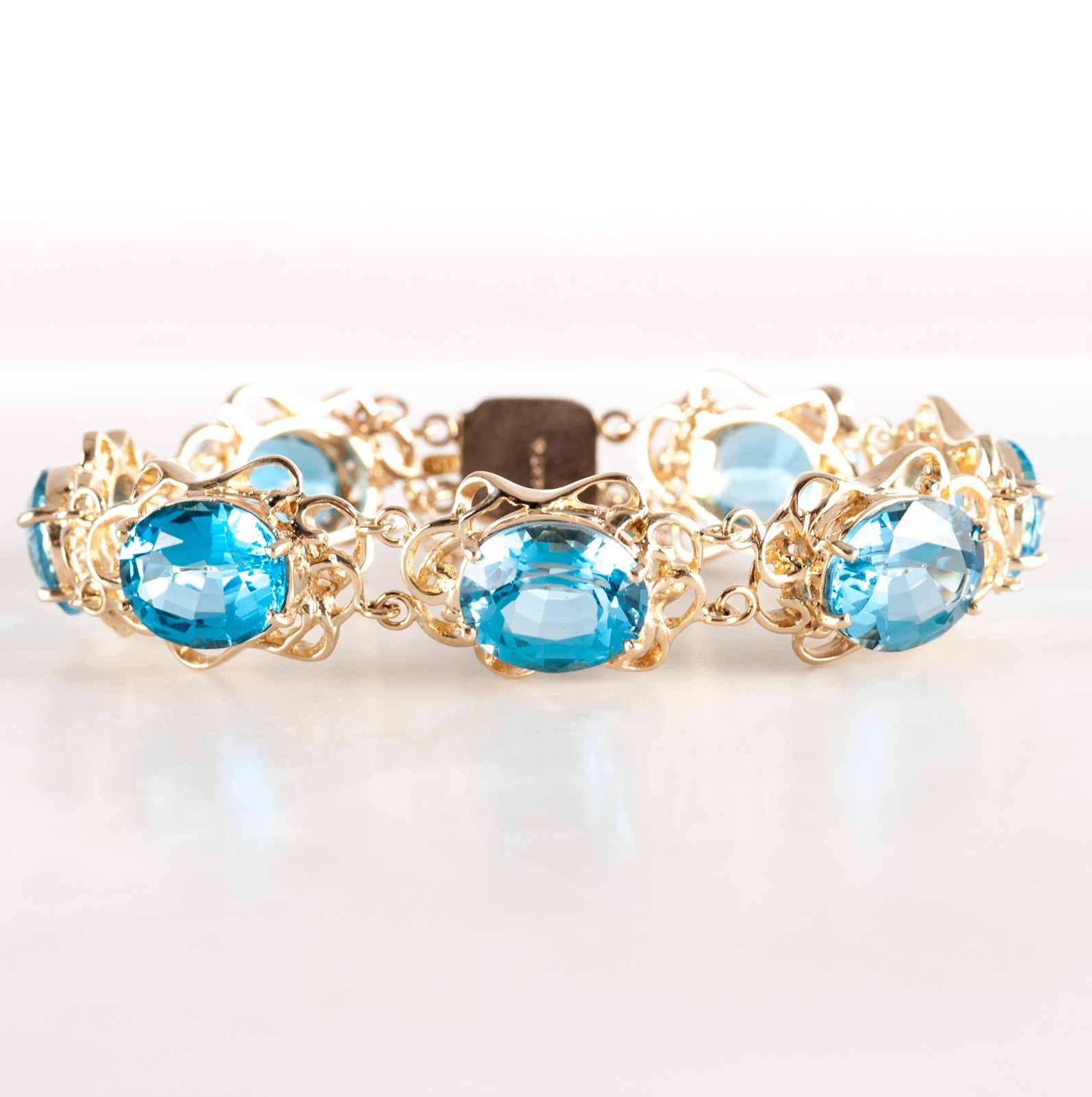 14k Yellow Gold Large Oval Swiss Blue Topaz Bracelet 42.0ctw 29.6g 6.5″ Length