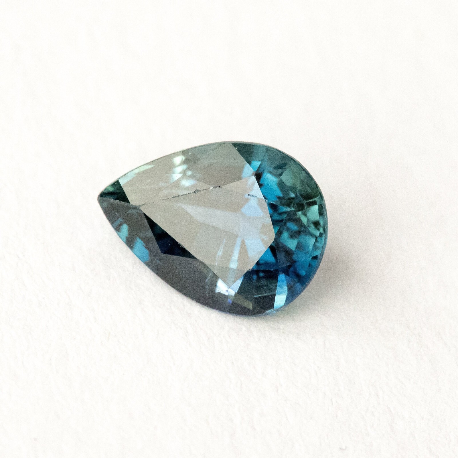 1.35ct Pear Shape Heated Natural Sapphire in Teal Green Peacock Blue Color