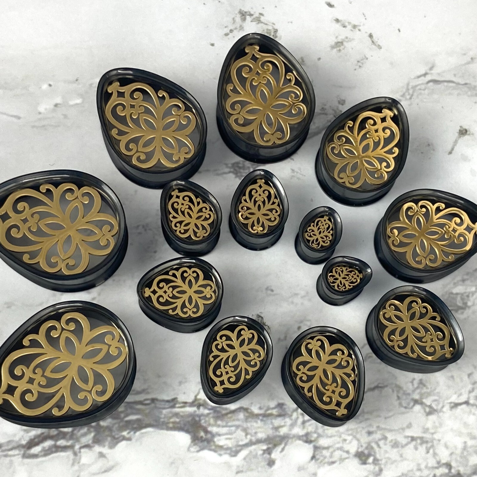 Pair Black Steel Teardrop Tunnels Gold Steel Inlay (PS-283) gauges plugs