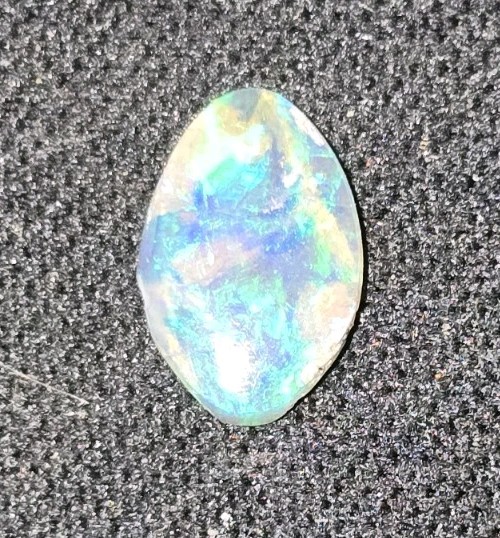 0.60 ct Natural Lightning Ridge Crystal Opal Oval Neon Green Aqua Blue Fire