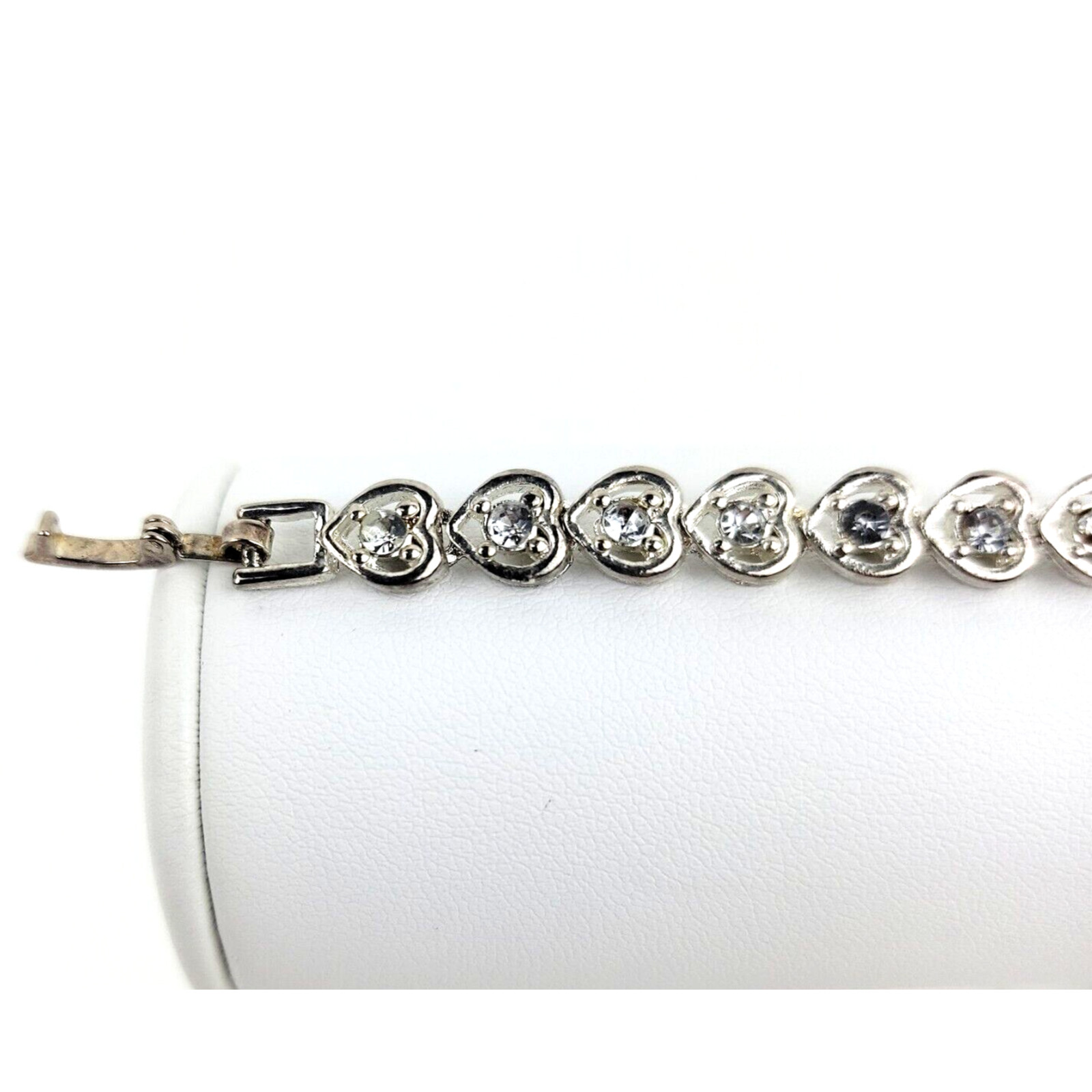 Heart Shaped Tennis Bracelet Silver Tone Link with Rhinestones Fold Over Clasp