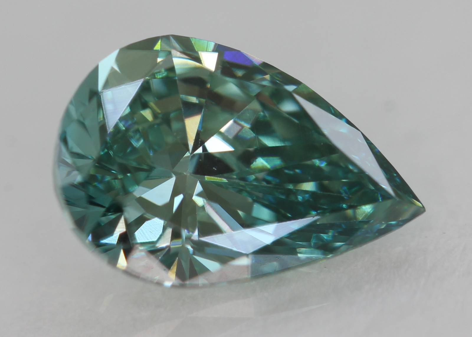 Cert 0.80 Carat Fancy Vivid Blue VVS1 Pear Natural Enhanced Diamond 7.83×5.37mm