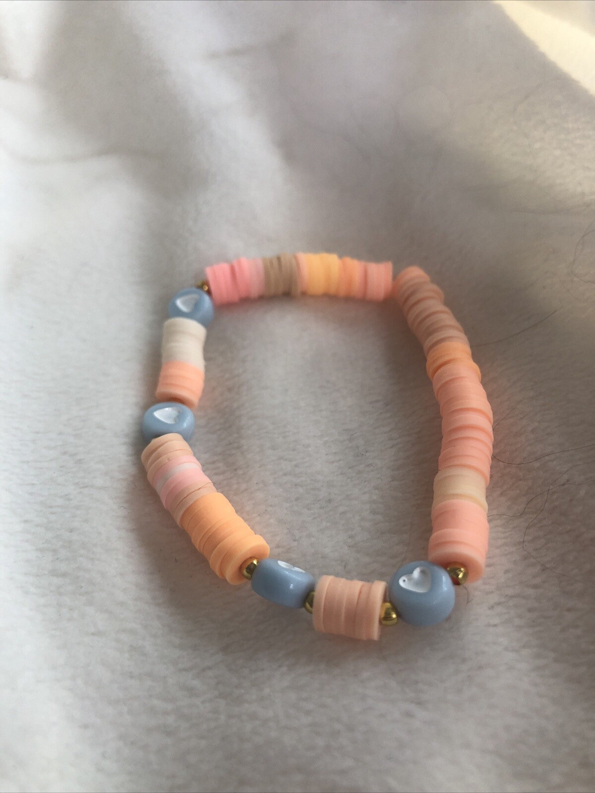 clay bead bracelet – blue hearts with tan/orange beads – 