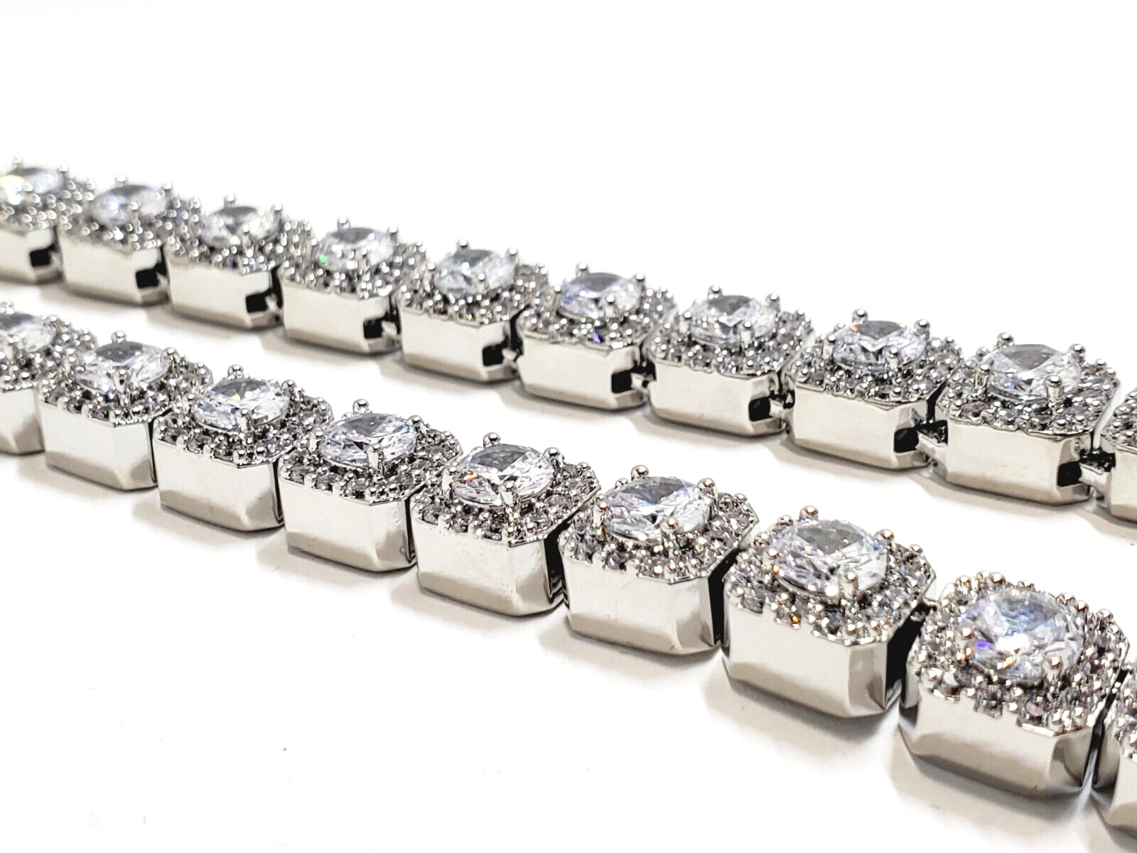 The Jewelry Plug Clustered Tennis Necklace in White Gold Plating