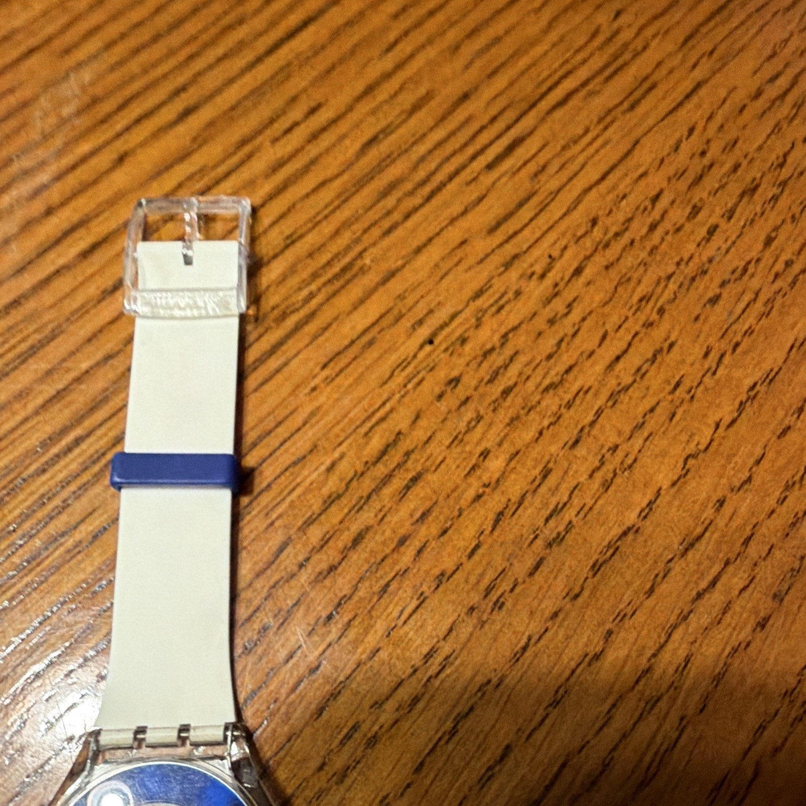Swatch Swiss Made Quartz Analog Blue Dial Clear Plastic Case White Strap