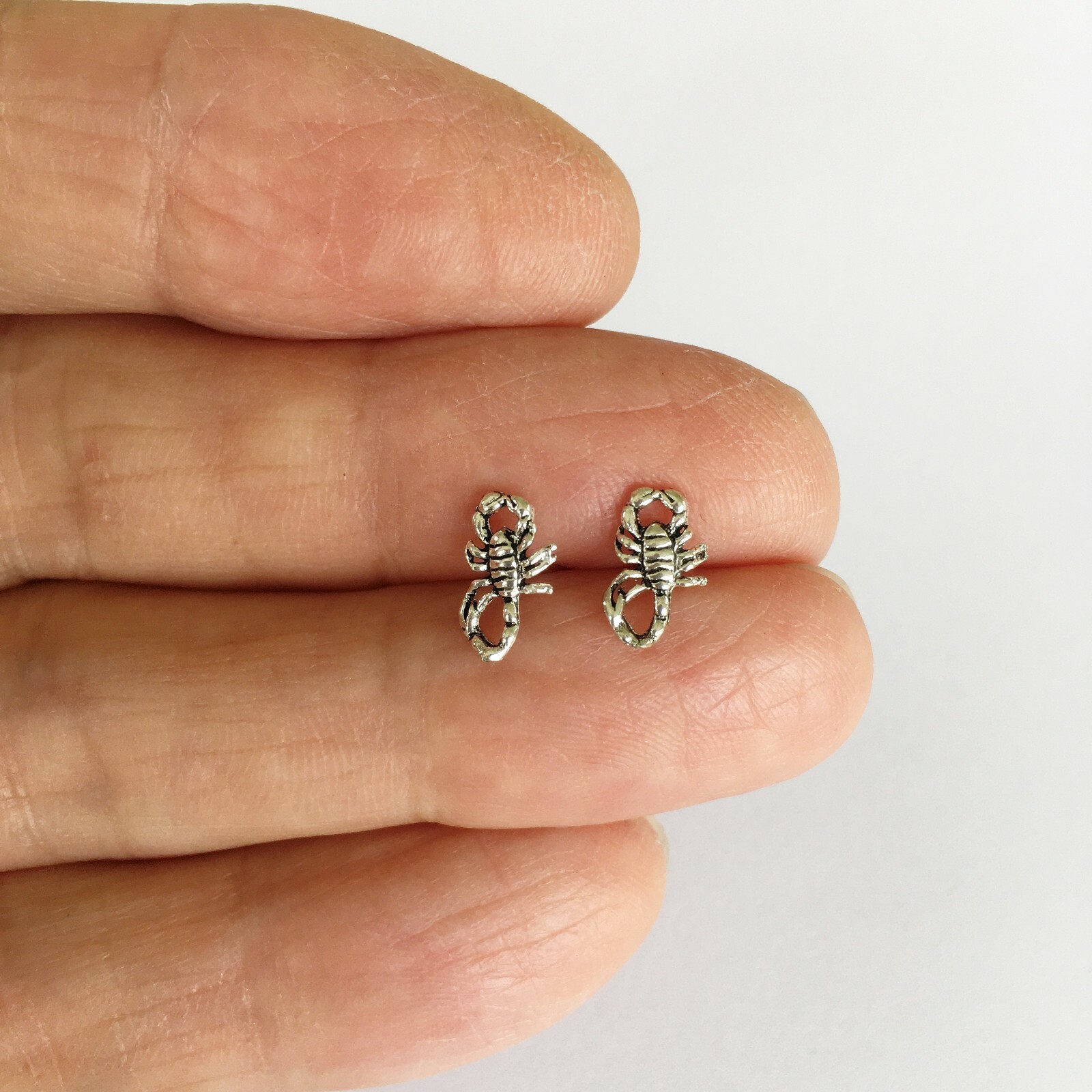 Sterling Silver 9.5mm dainty Scorpion post stud earrings.