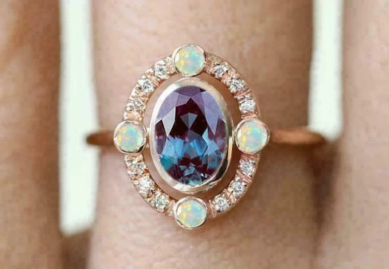 2.50Ct Oval Cut Lab-Created Opal Bezel Set Engagement Ring 14K Rose Gold Over